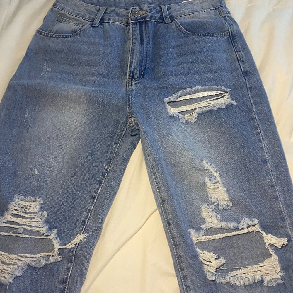 Distressed Blue Jeans